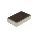 a square metal object on a black background