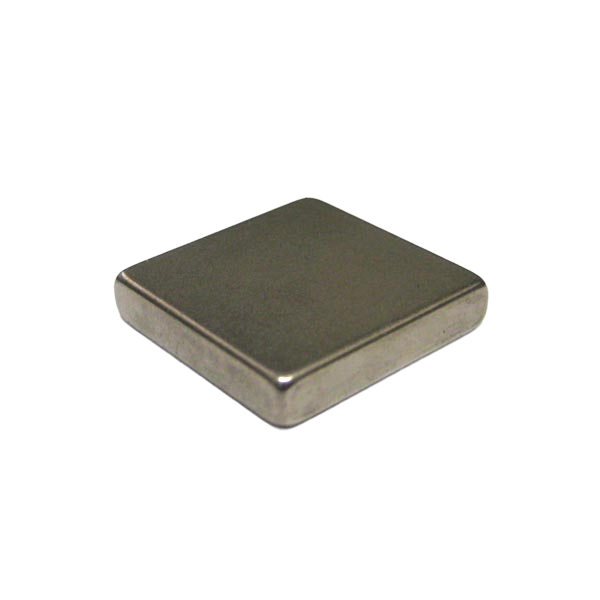 a square metal object on a black background
