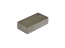 a square metal object on a black background