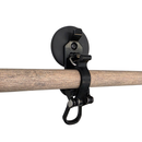 Magnetic locking clamp gripping a wooden tool handle horizontally against a steel surface