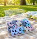 Sensory silicone magnetic alphabet letters packed in their clear storage case