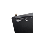 2mm x 2mm samarium cobalt rod magnet shown beside a ruler for scale