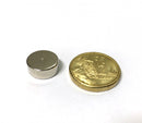 12mm x 5mm neodymium disc magnet beside an Australian one dollar coin for scale