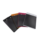 Rear of four mini magnetic clipboards, showing the thick rubber magnet panel covering the whole back