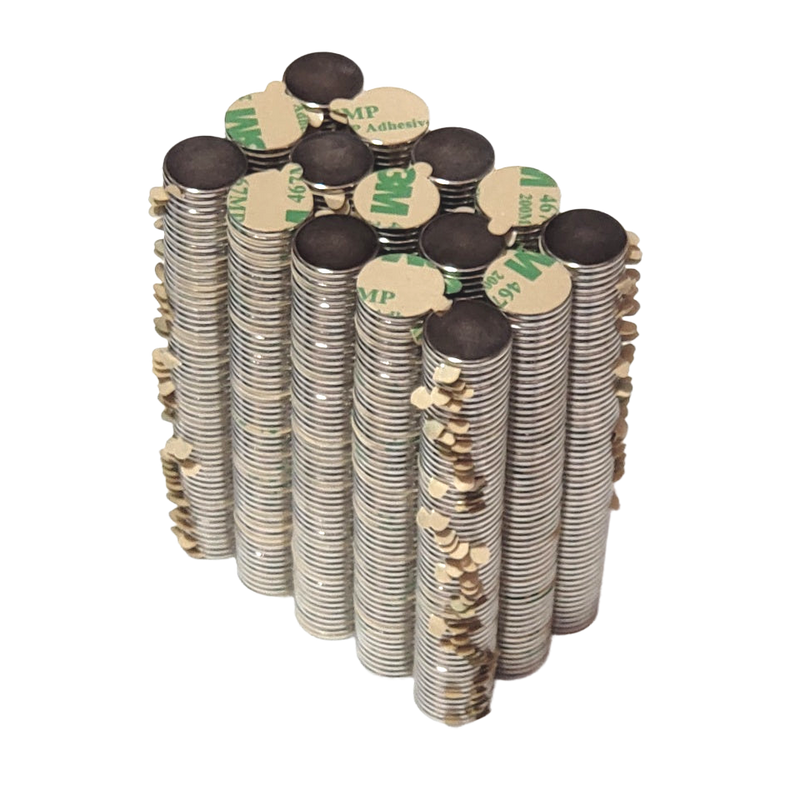 a stack of stacks of coins on a black background