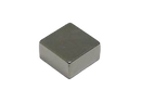 a square metal object on a black background