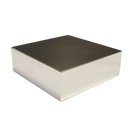 a square white box with a black lid