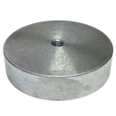 a round metal object on a black background