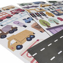 Close-up of die-cut magnetic vehicles, trees, traffic lights and road pieces on the play set sheets